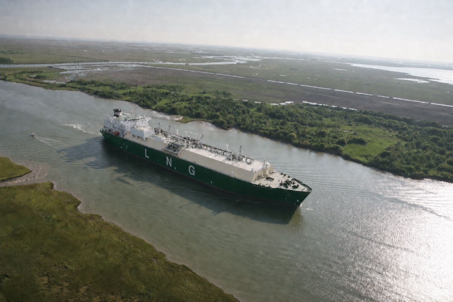 LNG carrier transiting a coastal channel